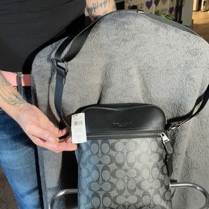Coach men’s line crossbody. Brand new with tags.